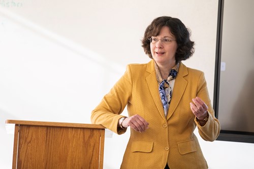Photo of a professor teaching a theology class for ministry.